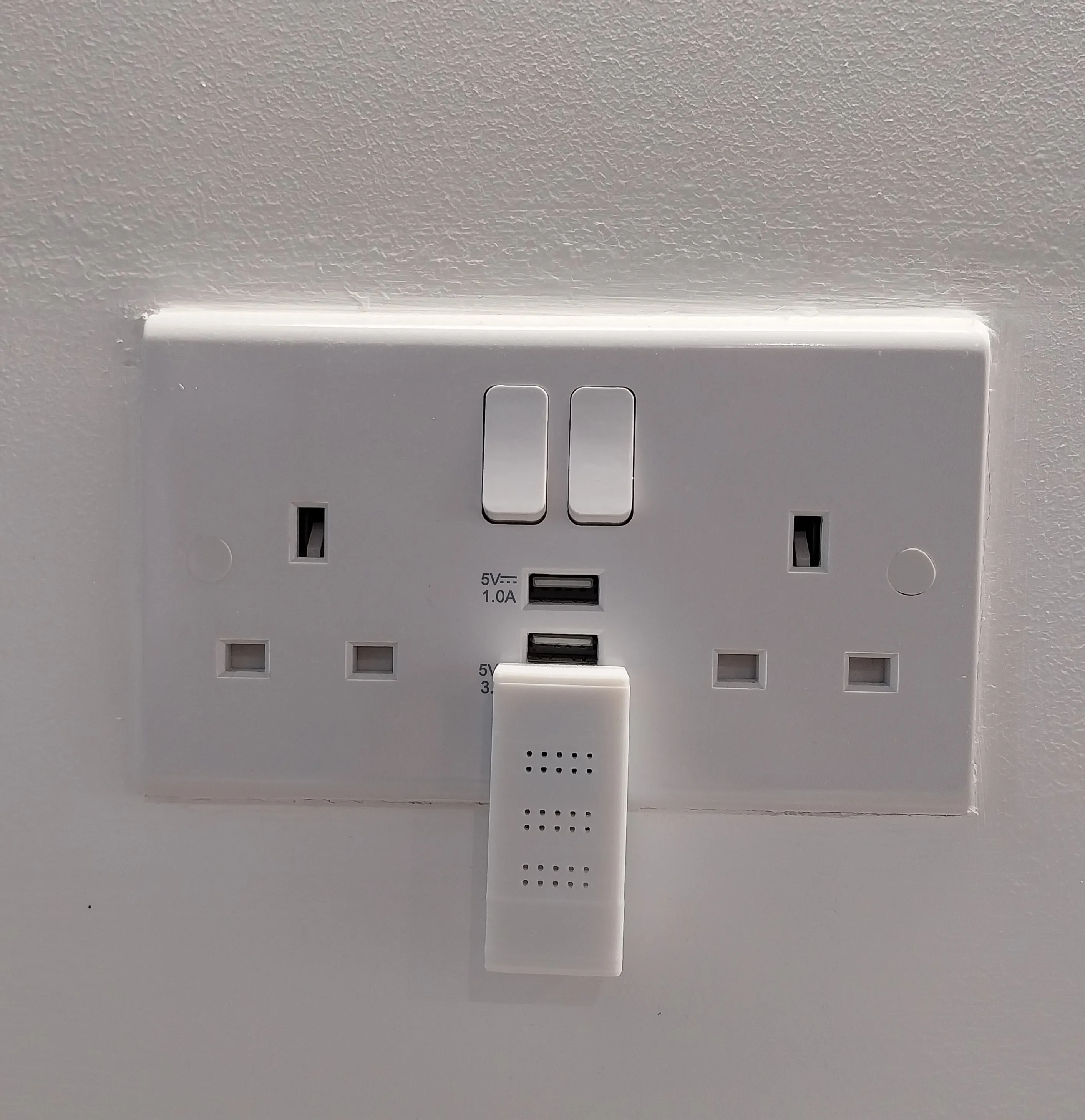 Bluetooth Proxy Stick angled in wall socket